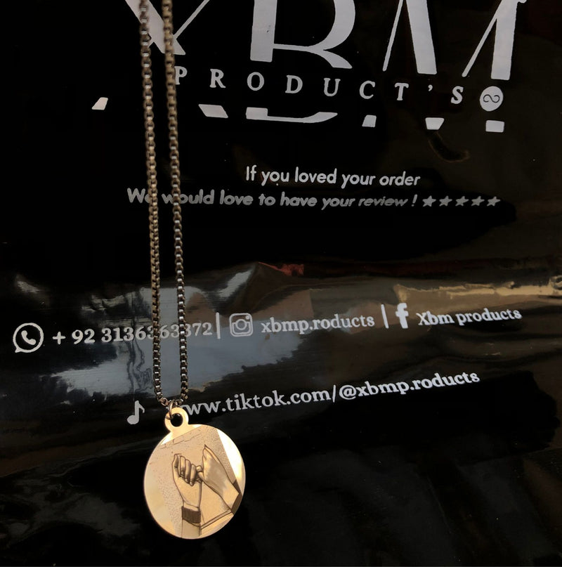 Engraved coin locket